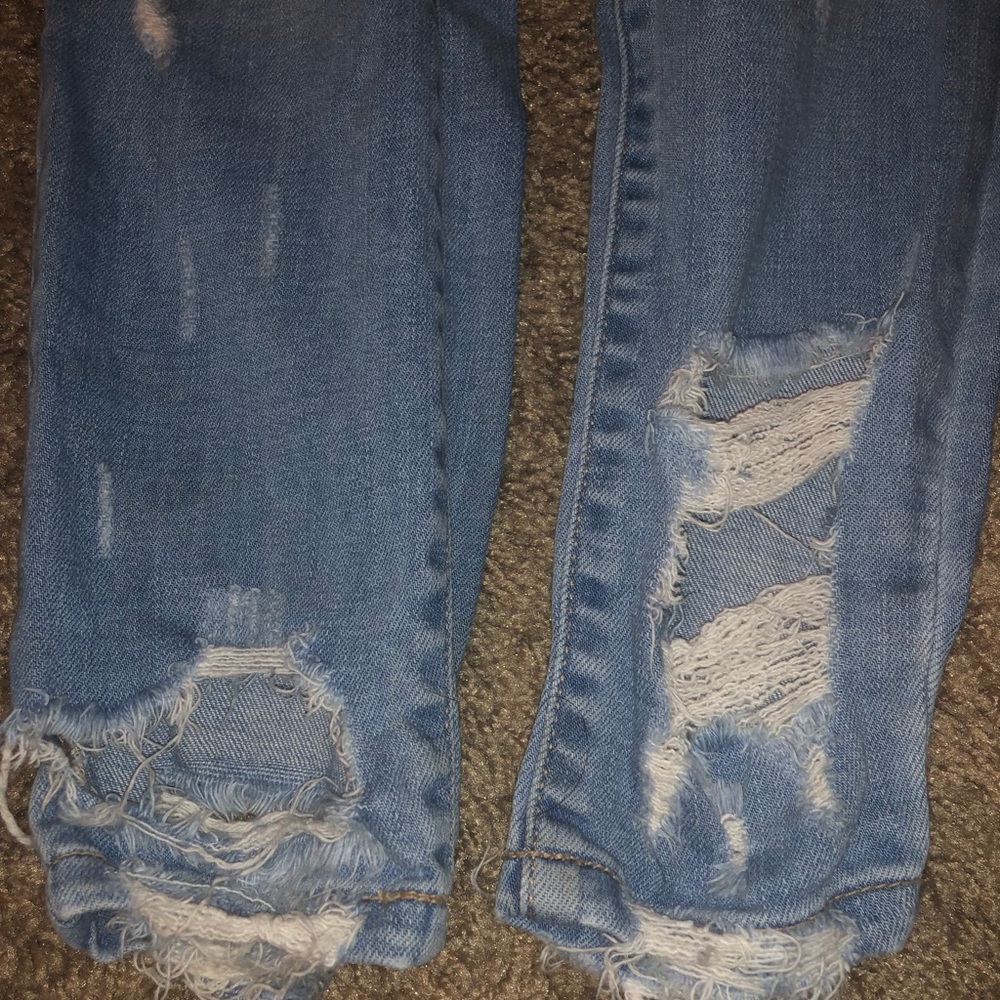 Ripped hem jeans